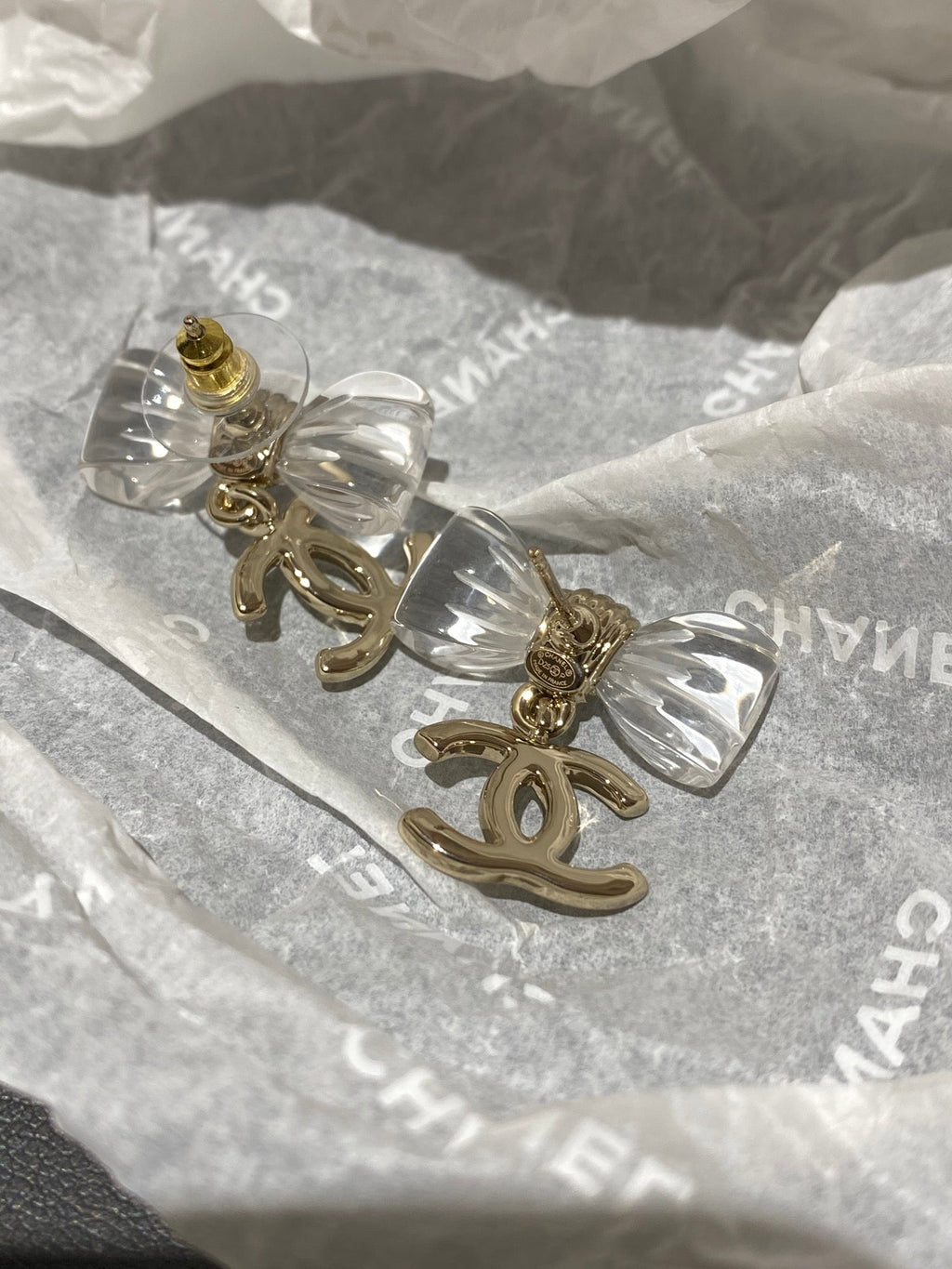 Chanel Transparent Acrylic Bow Gold Earrings